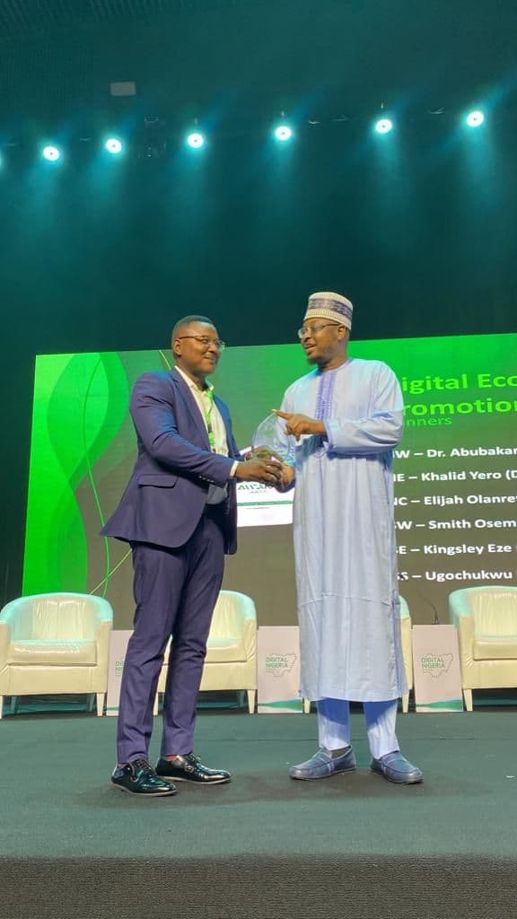 Mr. Smith Osemeke, MD of Unitellas, recieving the South West zone - Digital Economy Promoter Award